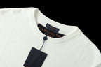 White crewneck collar with brand label and hanging tag on T-shirt