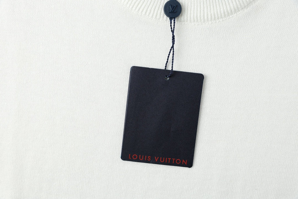 White crewneck T-shirt with hanging navy product tag