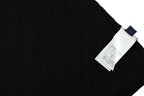 Black T-shirt with subtle monogram pattern, side detail with hanging tag