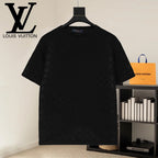 Black crewneck T-shirt with subtle monogram pattern, short sleeves on hanger