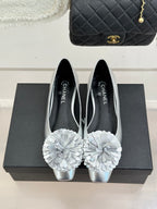 Chanel ladies silver ballet flats with white flower appliques on the toe