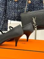 Hermes ladies black leather pointed-toe pump with stiletto heel and ankle strap