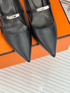 Hermes ladies black pointed-toe leather pumps with ankle strap and silver buckle