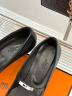 Hermes ladies black pointed-toe leather pumps with ankle strap, silver buckle detail