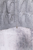 Heather gray knit sweater back hem with half-zip pull tab