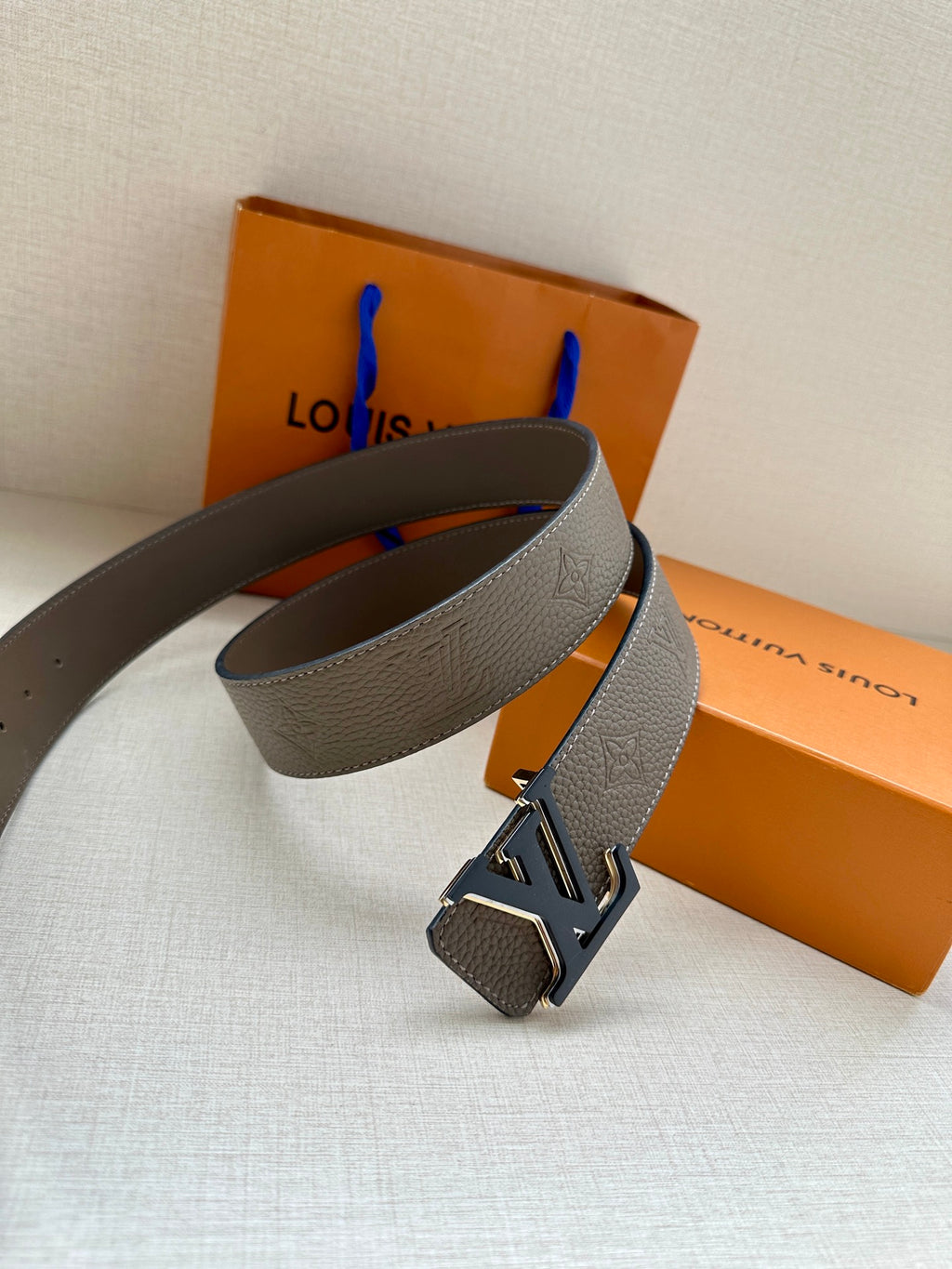 Louis Vuitton belt gray leather with silver LV buckle and keeper end