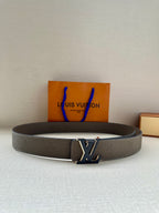 Louis Vuitton belt in gray textured leather with silver-tone LV buckle