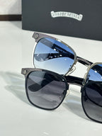 Sunglasses pair with mirrored blue lenses, chrome-and-black frames, logo temples
