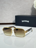 Gold square sunglasses with tinted lenses and rhinestone logo detail
