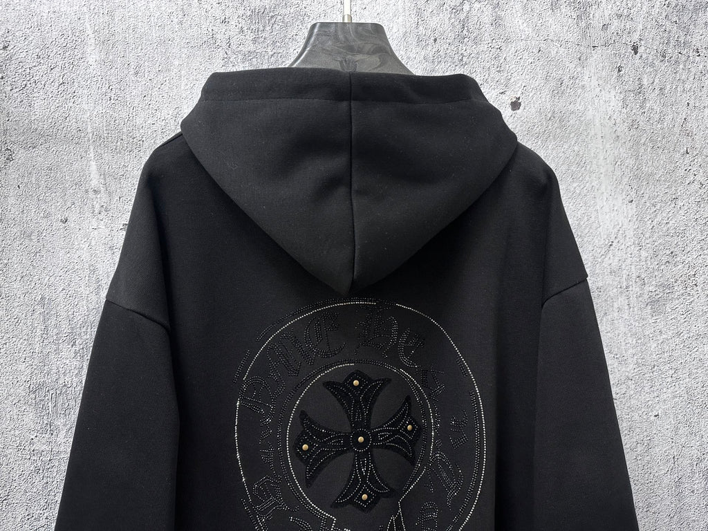 Black zip-up hoodie with rhinestone back graphic centered under hood