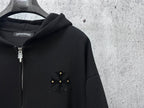 Black zip-up hoodie with rhinestone chest emblem and silver zipper detail