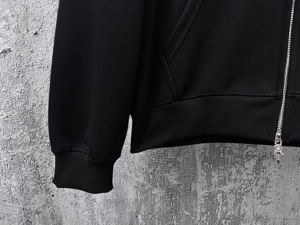 Black hoodie lower front with ribbed hem and kangaroo pocket opening