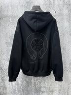 Black zip-up hoodie with large rhinestone back graphic and hood