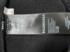 Balenciaga hoodie interior care label on dark fabric