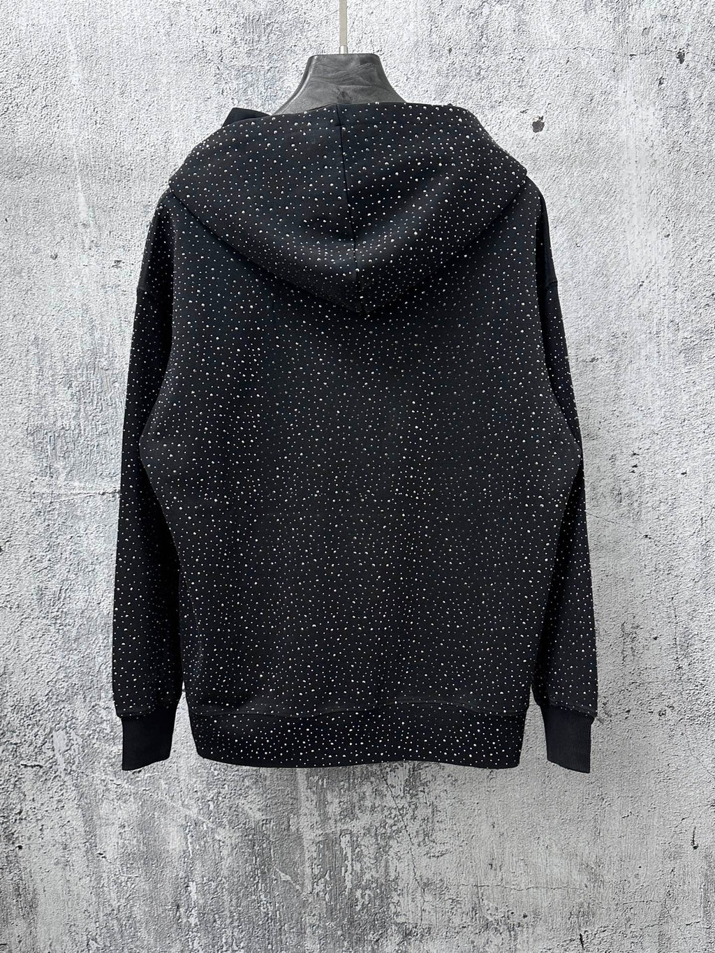 Balenciaga long-sleeve hoodie back, dark with white speckle print and hood