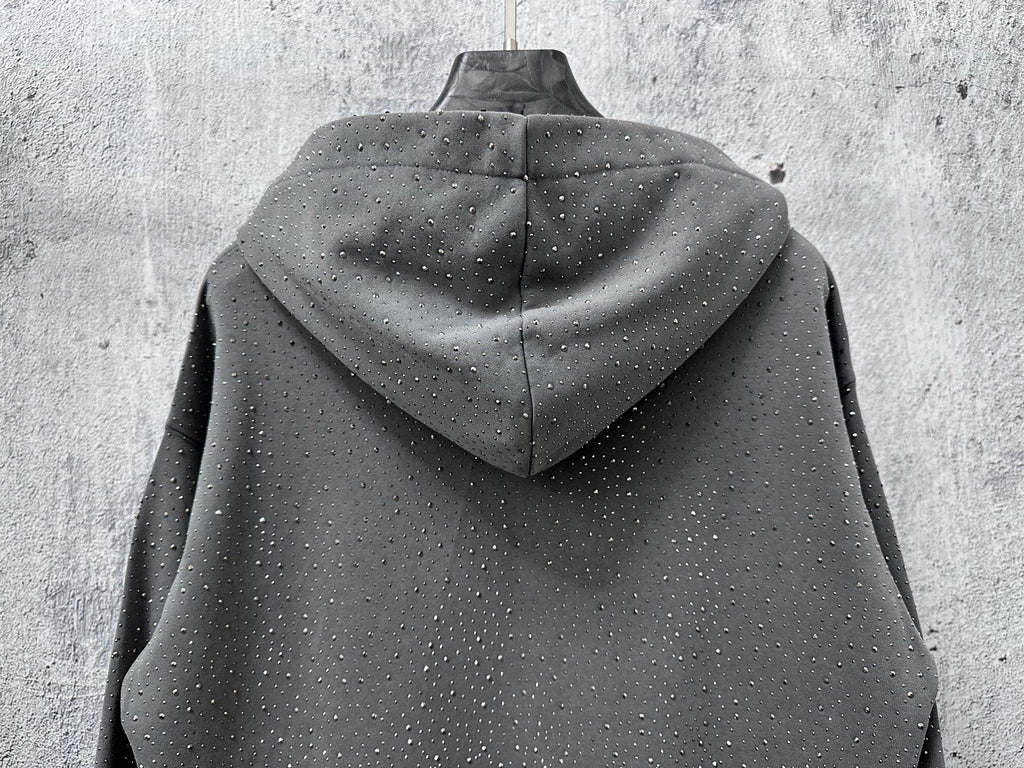 Long-sleeve hoodie back view, dark gray with cowl hood and speckled dots