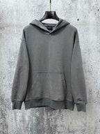 Balenciaga long-sleeve hoodie, dark gray with hood and kangaroo pocket, speckled dots