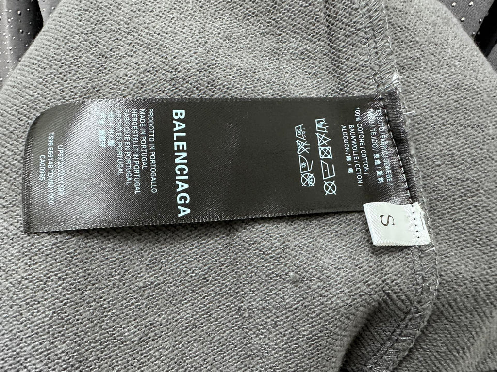 Balenciaga label on gray hoodie tag, care symbols and size S