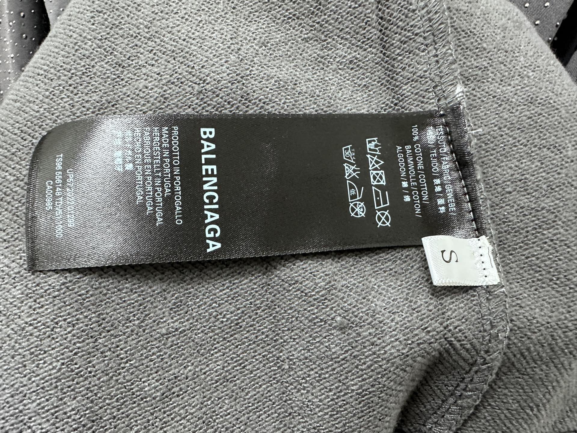 Balenciaga label on gray hoodie tag, care symbols and size S