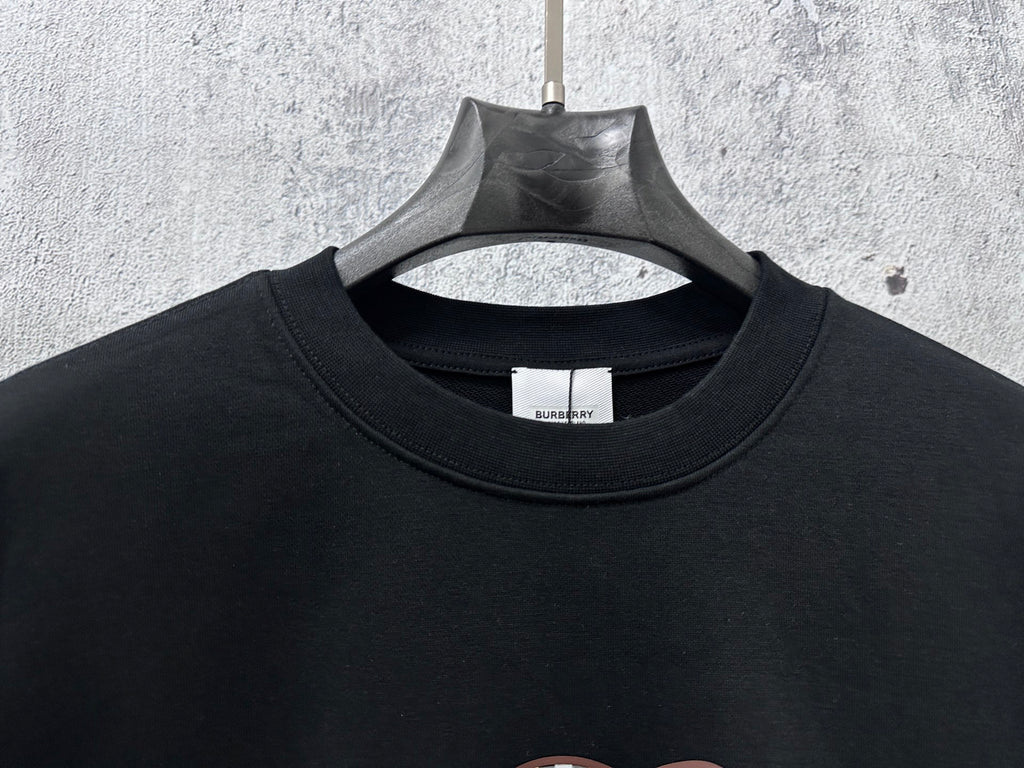Black crewneck sweatshirt with Burberry neck label