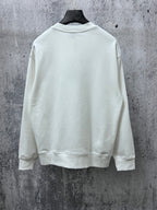 White crewneck long-sleeve sweatshirt, plain back view with ribbed cuffs