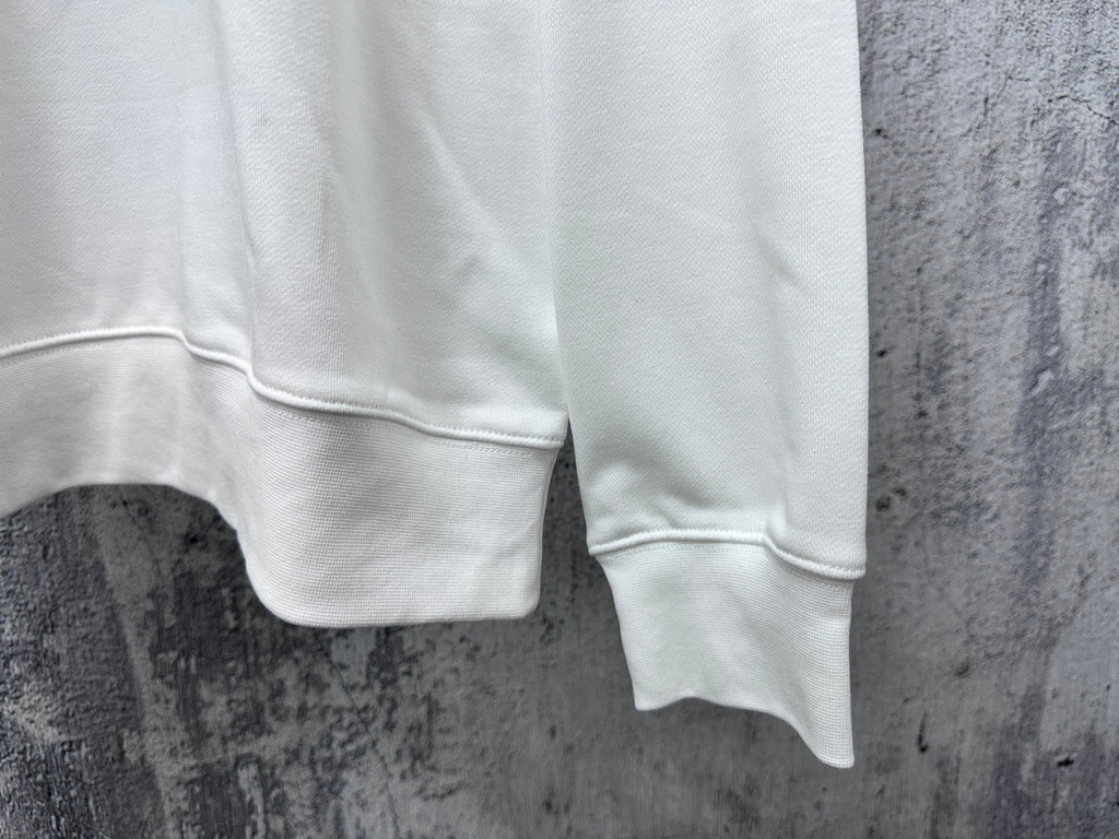 White sweatshirt sleeve cuff and hem with ribbed cuffs and soft fleece finish