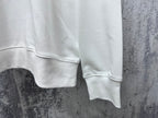White sweatshirt sleeve cuff and hem with ribbed cuffs and soft fleece finish
