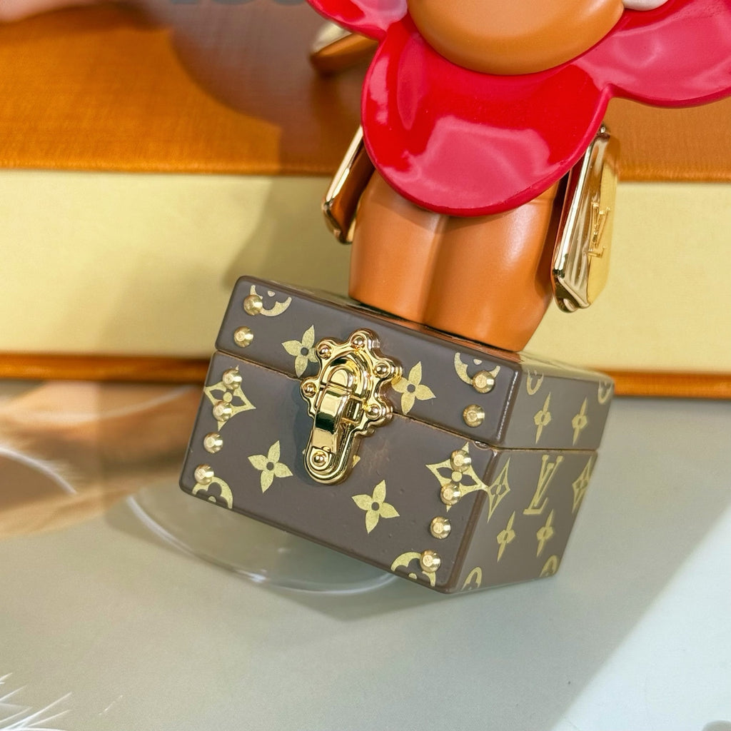 Louis Vuitton bear charm keychain with brown monogram base and gold hardware