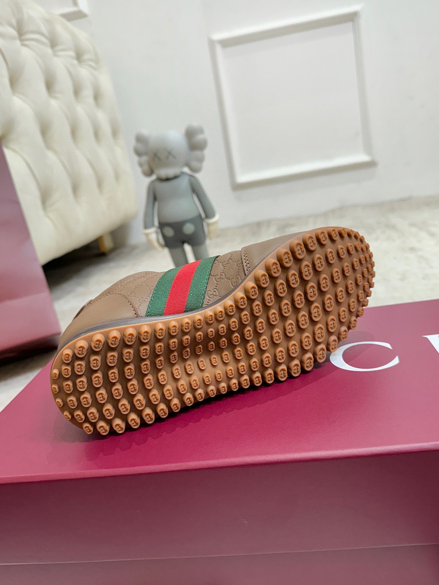 Gucci unisex sneaker outsole, tan rubber tread with small circular pattern