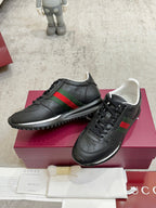 Gucci unisex sneakers, black lace-up with green and red stripe, sporty low-profile sole