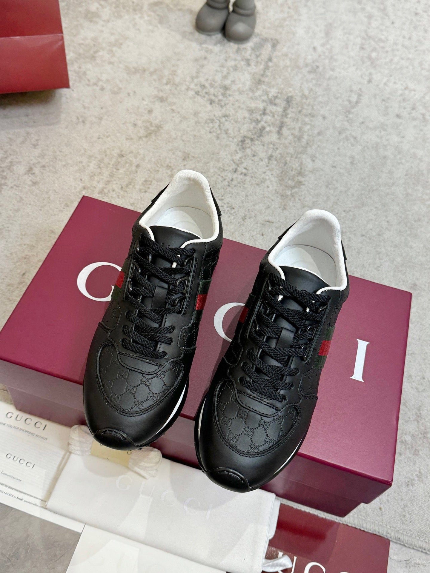 Gucci unisex lace-up sneakers, black with green and red web stripe, low rubber sole