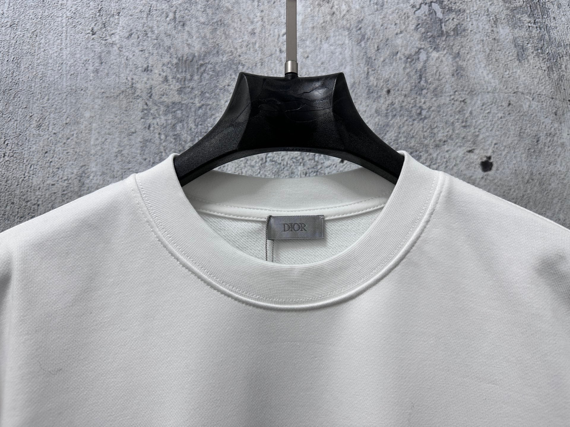White sweatshirt crew neck with Dior label on inner collar