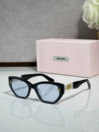 Black sunglasses with tinted lenses and pink logo case