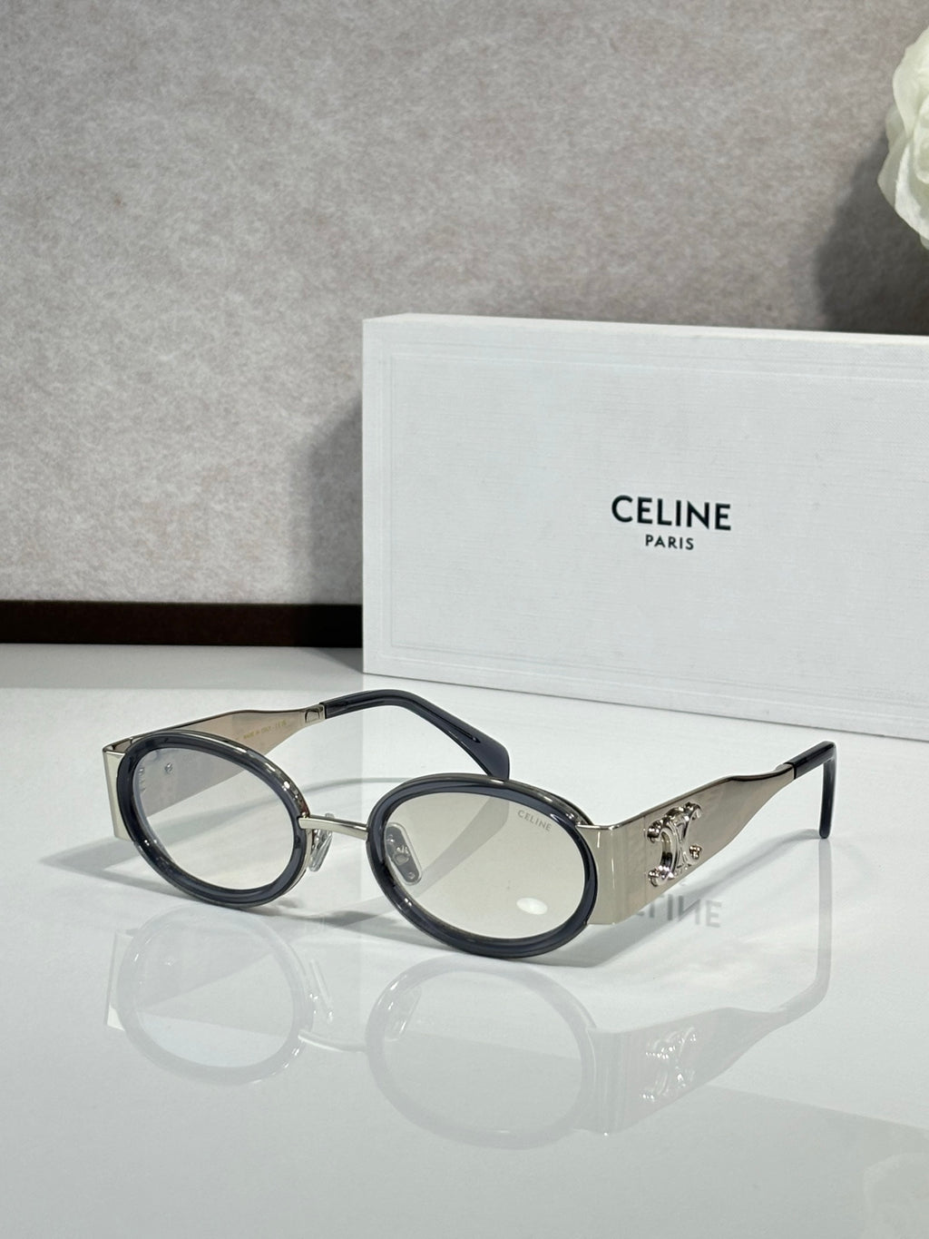 Celine dark round glasses with silver arms and light-tinted lenses