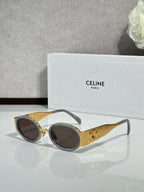Celine gold metal glasses with brown-tinted lenses and round frames