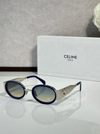 Celine blue round glasses with gold accents and dark tinted lenses
