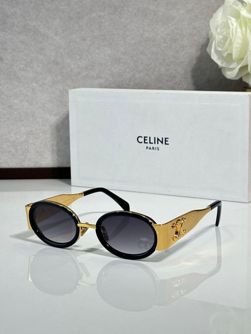 Celine round black glasses with gold details and dark tinted lenses