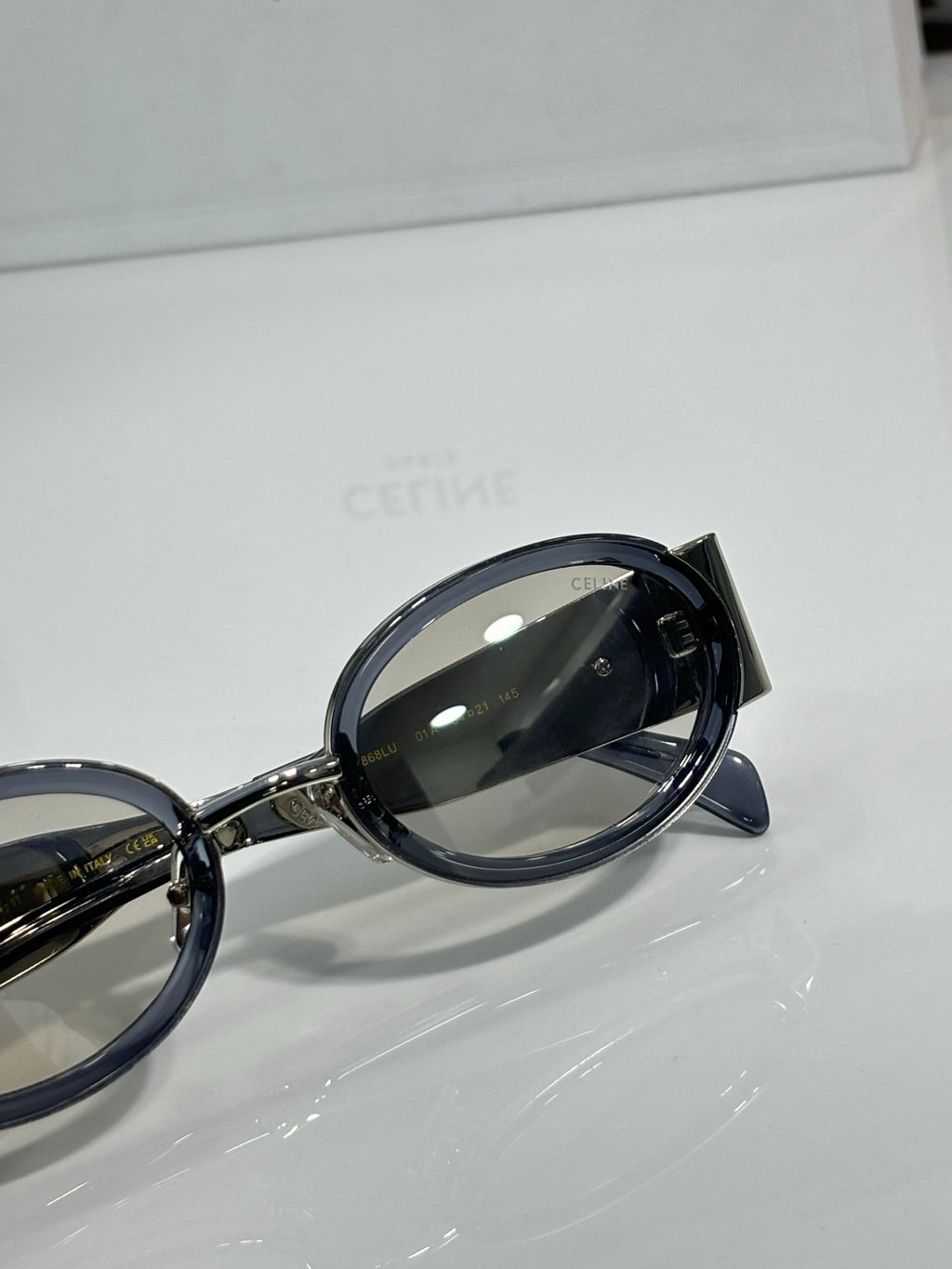 Celine close-up black round glasses with dark lens and metal temple
