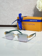 Louis Vuitton sunglasses with green-tinted frames and pale lenses