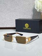 Gold-tone rectangular sunglasses with amber lenses and tortoise temples with logo medallion
