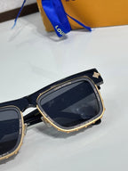 Louis Vuitton square sunglasses with black frame and gold rhinestone-style details
