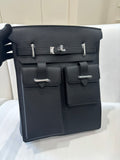 Hermes pebbled leather flap bag, dark with silver clasp and front straps