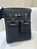 Hermes pebbled leather flap bag, dark with silver clasp and front straps