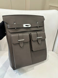 Hermes leather flap handbag in gray with turn-lock clasp and front strap pockets