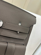 Hermes leather flap handbag gray with metal turn-lock detail and top flap stitching