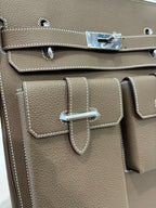 Hermes bag taupe leather front double-pocket flap with metal closure and stitched trim