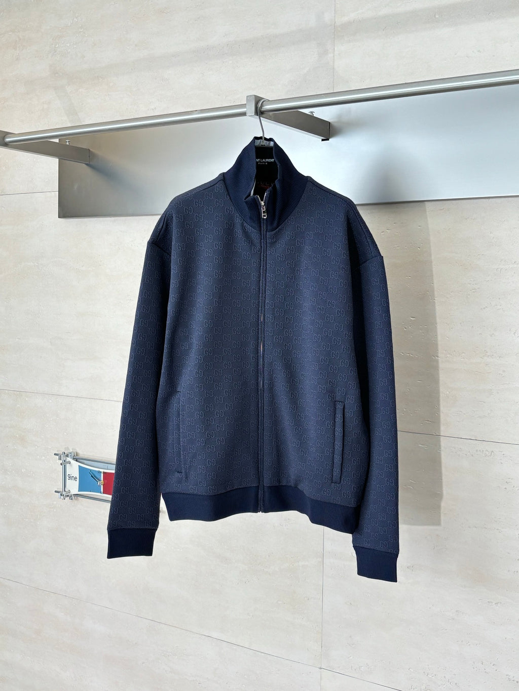 Navy Gucci zip-up jacket with high collar and ribbed cuffs