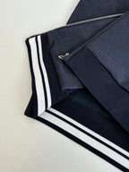 Navy Gucci jacket collar and sleeve cuff with white striped knit trim