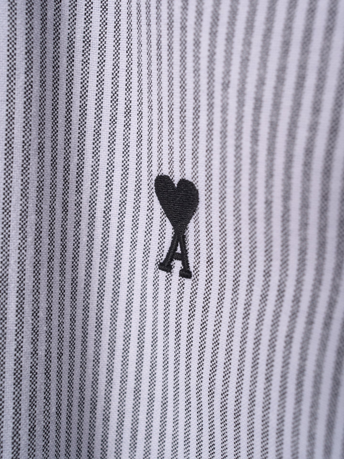 Striped shirt fabric with black heart A logo