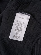 Black Dior hoodie interior care label on fabric tag